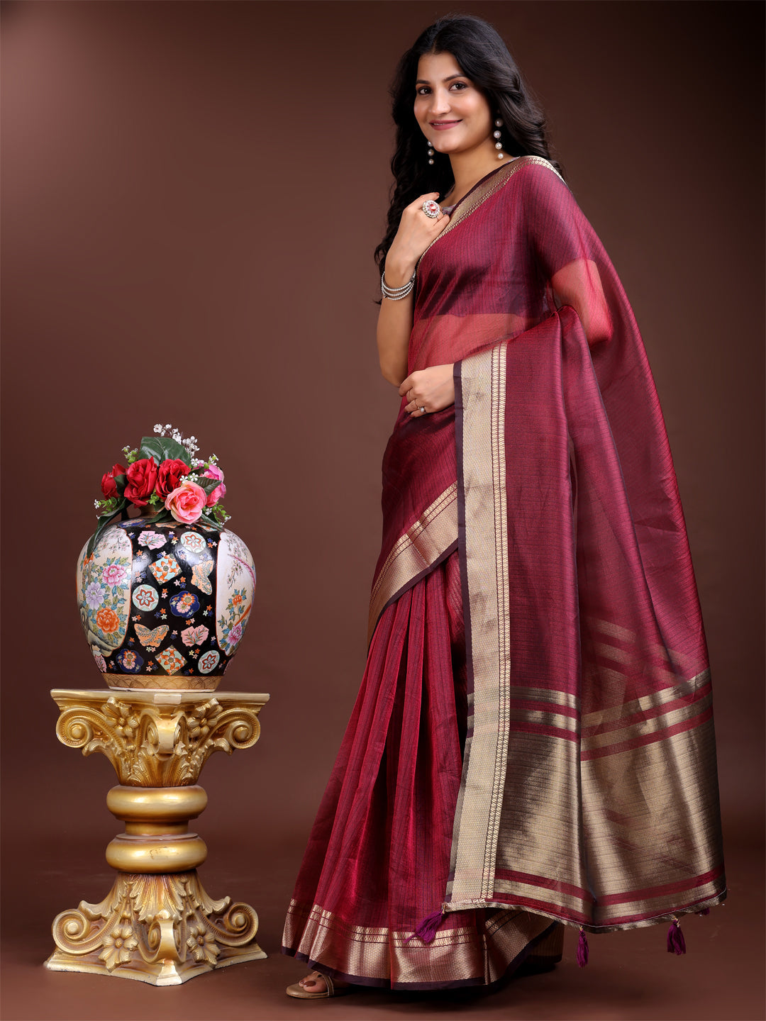 Magenta Organza Saree with Woven Zari Work and Tassels