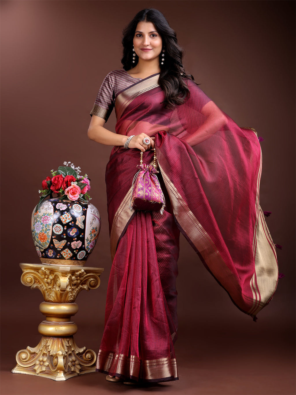 Magenta Organza Saree with Woven Zari Work and Tassels