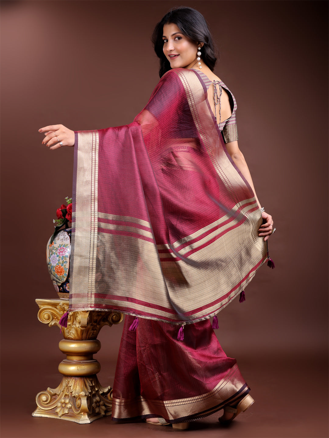 Magenta Organza Saree with Woven Zari Work and Tassels