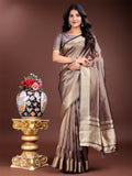 Elegant brown organza saree with woven zari embroidery and tassel border