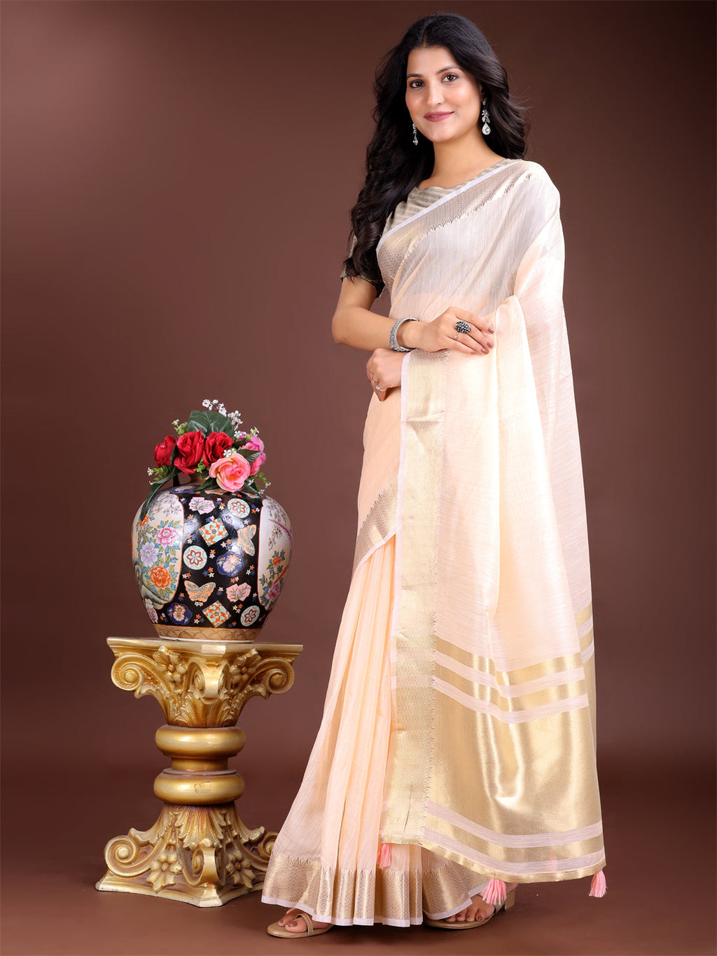 Peach Woven Linen Saree with Contrast Zari Border & Tassels