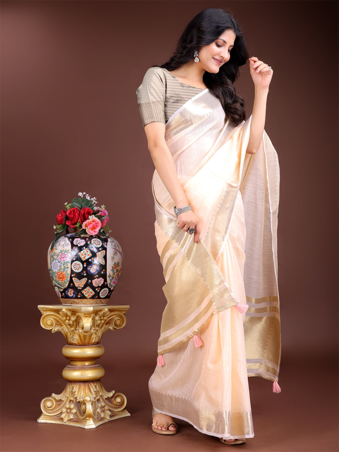 Peach Woven Linen Saree with Contrast Zari Border & Tassels