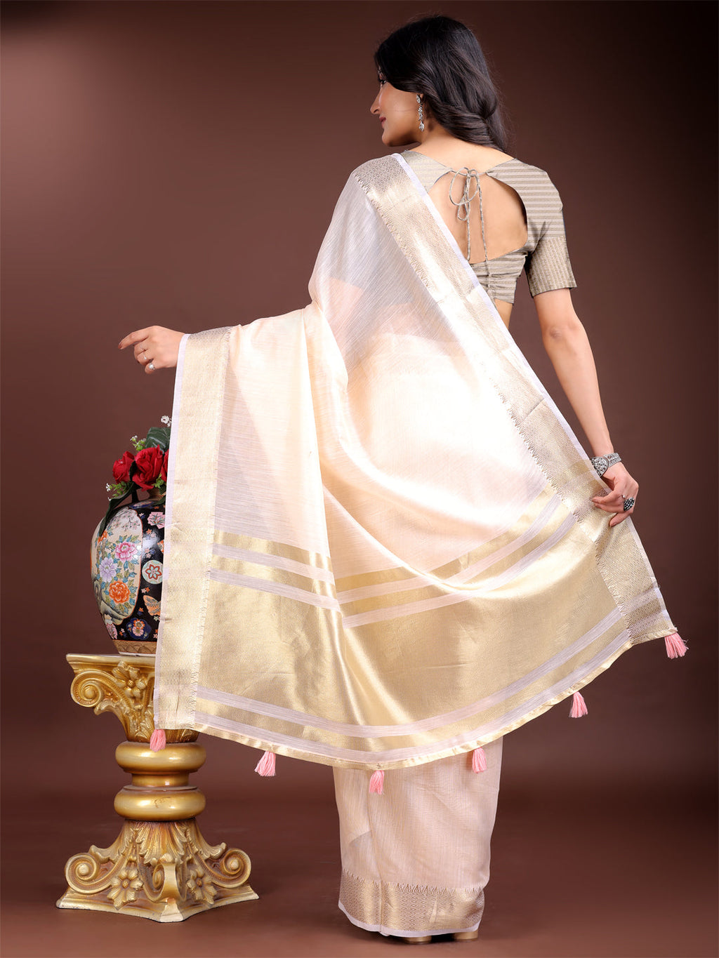 Peach Woven Linen Saree with Contrast Zari Border & Tassels