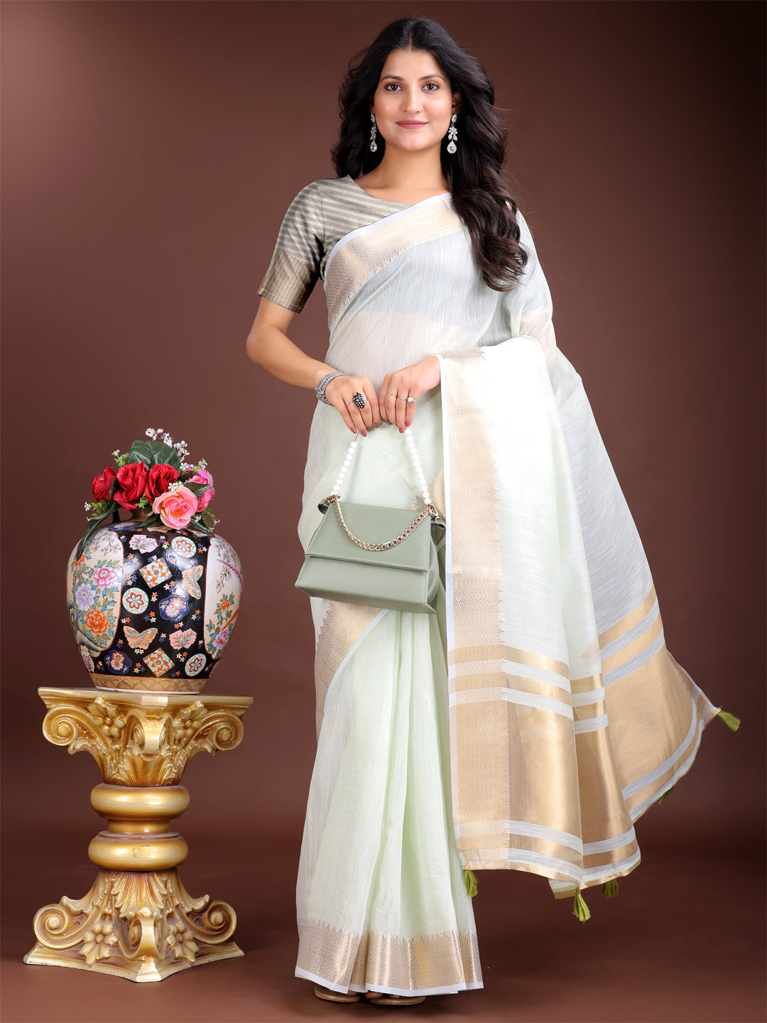 Light Green Woven Linen Saree with Contrast Zari Border & Tassels