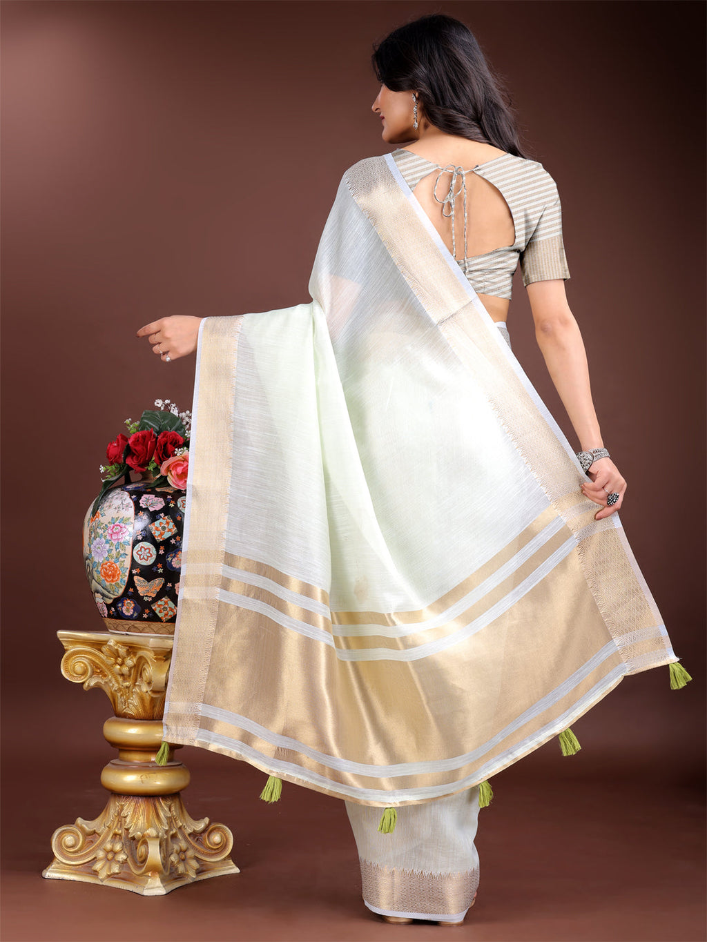 Light Green Woven Linen Saree with Contrast Zari Border & Tassels