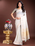 Elegant grey linen saree with contrast zari border and decorative tassels