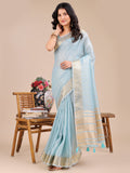 Lightweight sky blue organza saree with woven zari work and traditional tassels