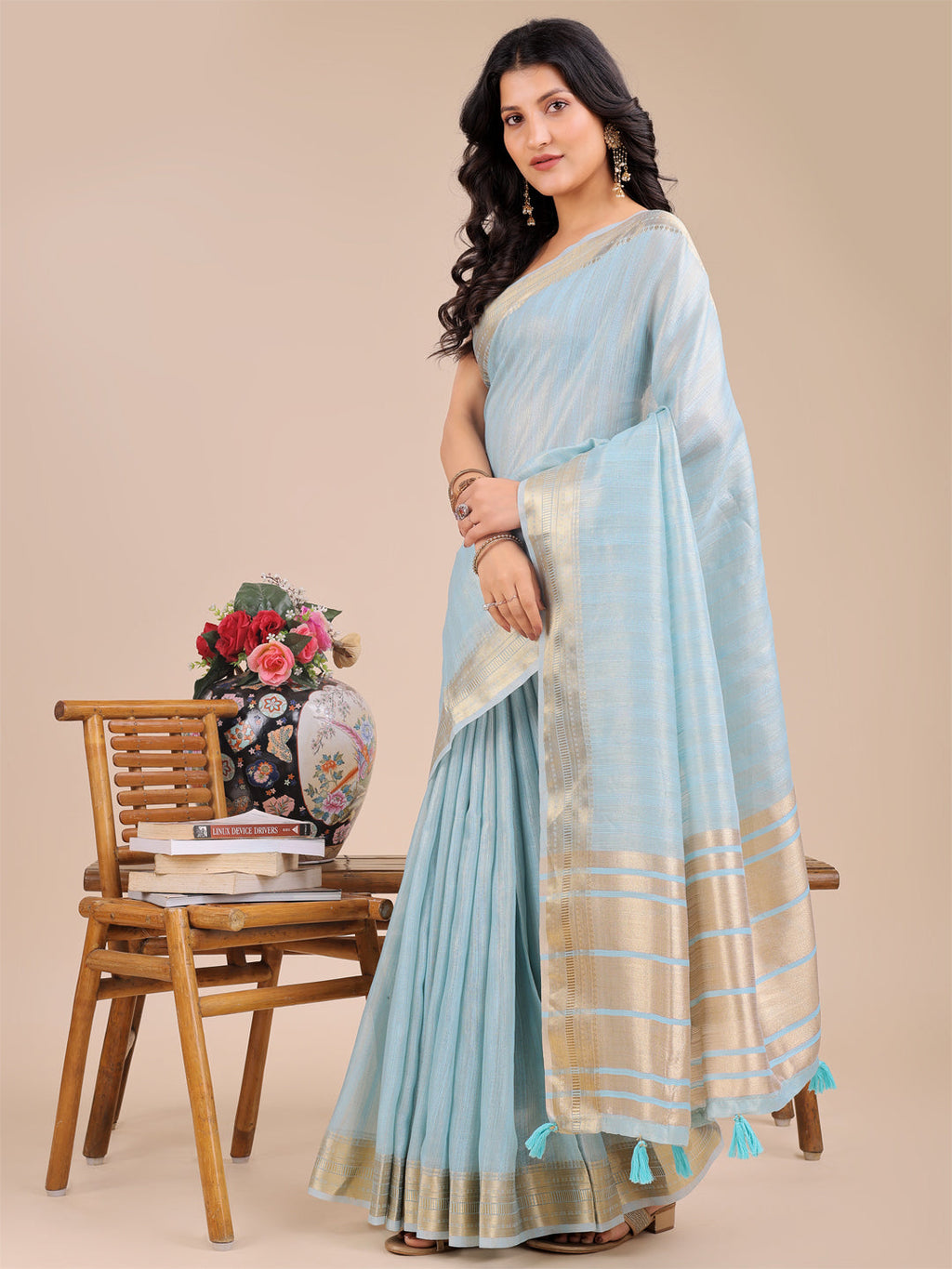 Sky Blue Organza Saree with Woven Zari Work and Tassels