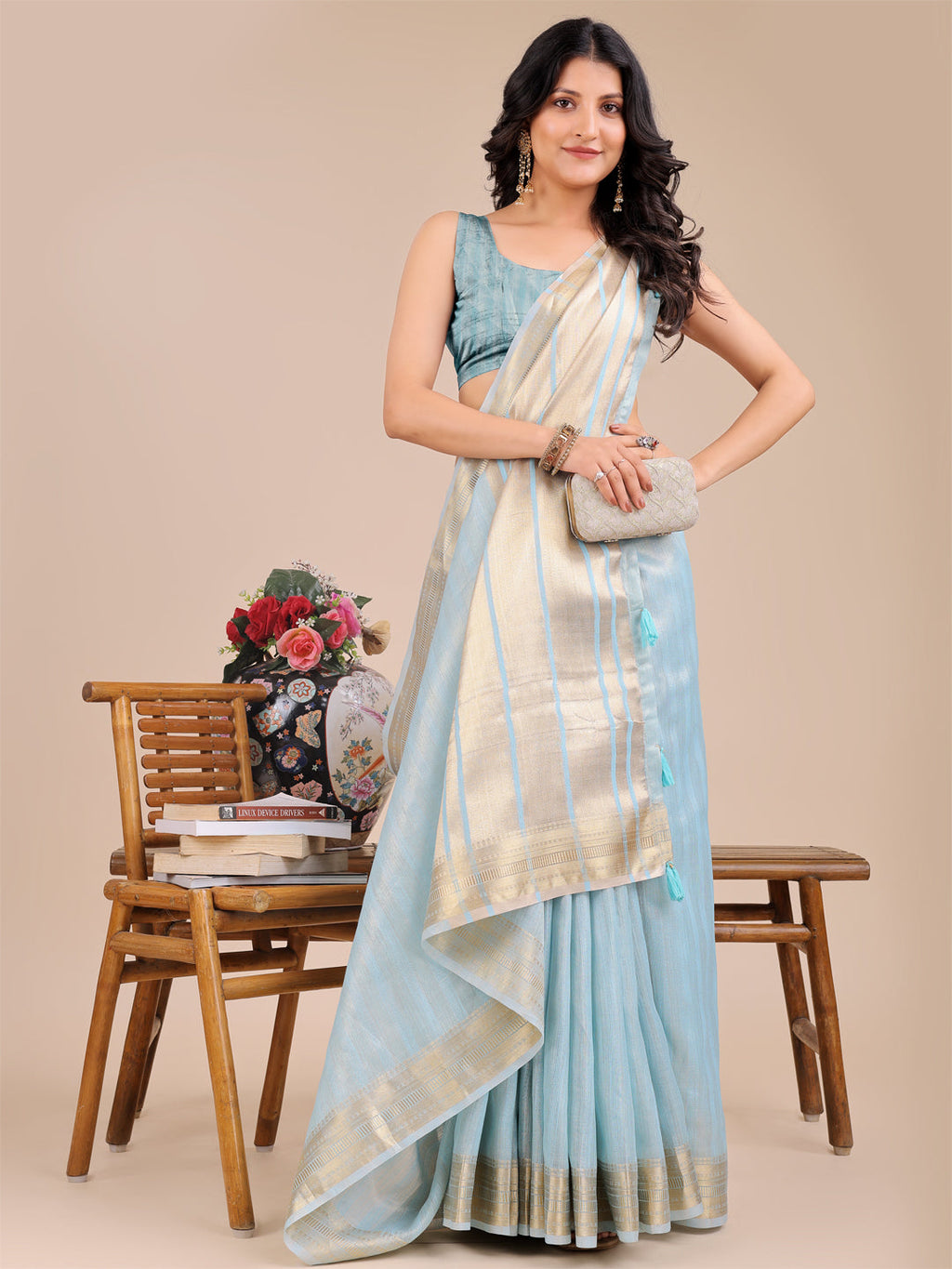 Sky Blue Organza Saree with Woven Zari Work and Tassels