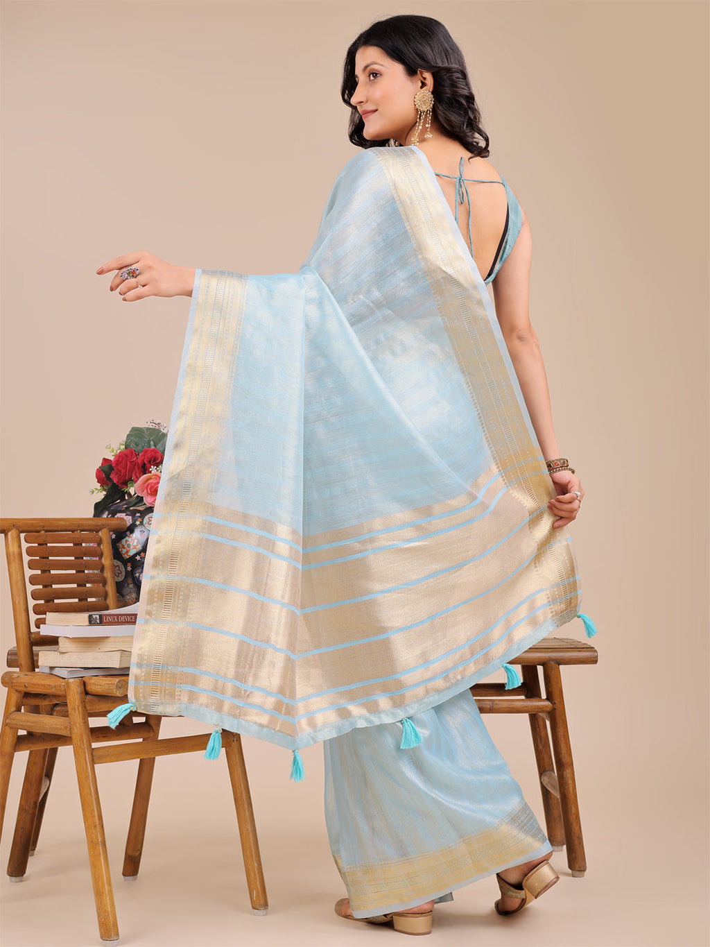 Sky Blue Organza Saree with Woven Zari Work and Tassels