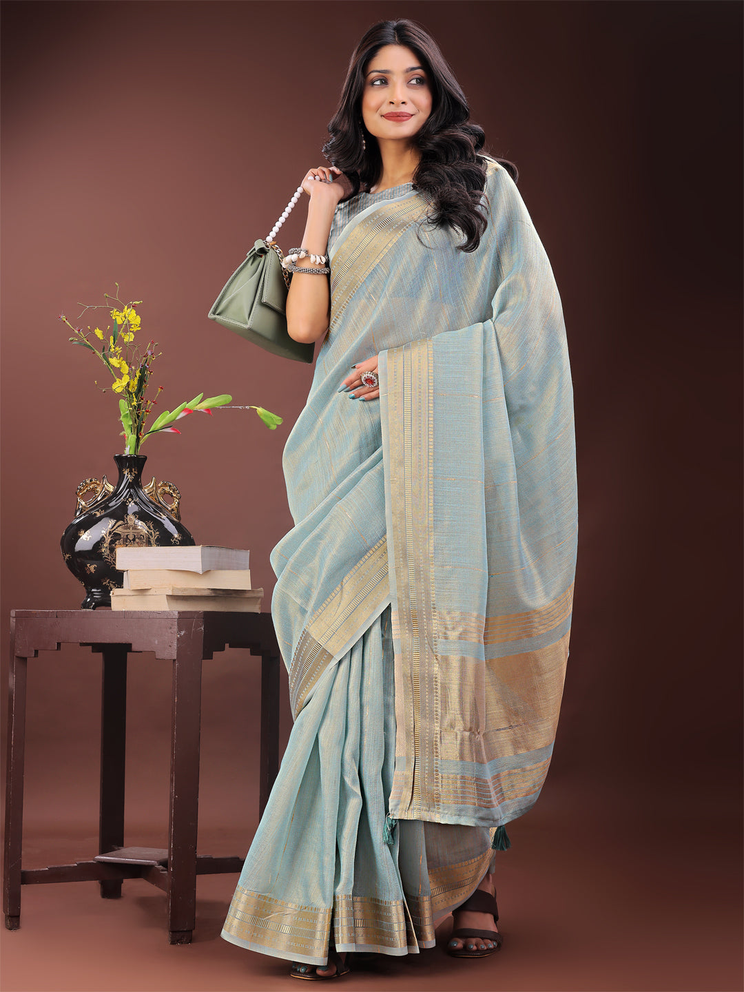 Sky Blue Organza Saree with Golden Zari Border and Blouse Piece