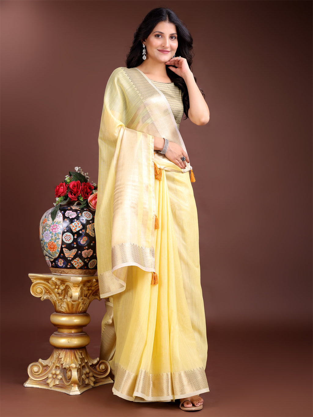 Yellow cotton ready-to-wear saree with gold borders and pre-stitched waist detail