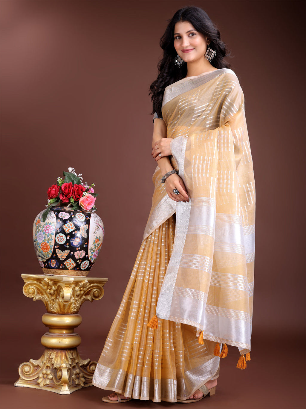 Yellow Organza Saree with Woven Zari Work and Tassel Detail