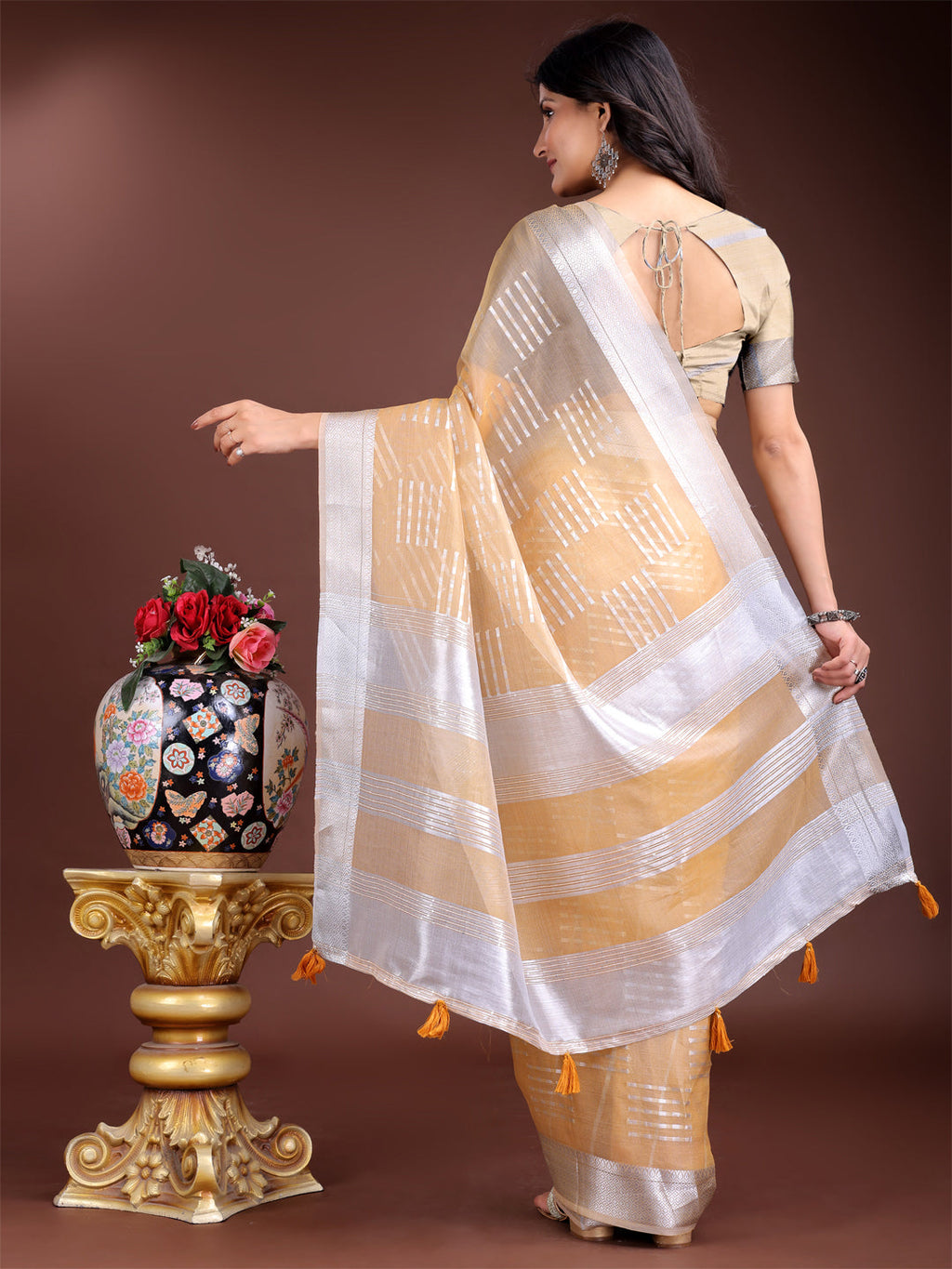 Yellow Organza Saree with Woven Zari Work and Tassel Detail