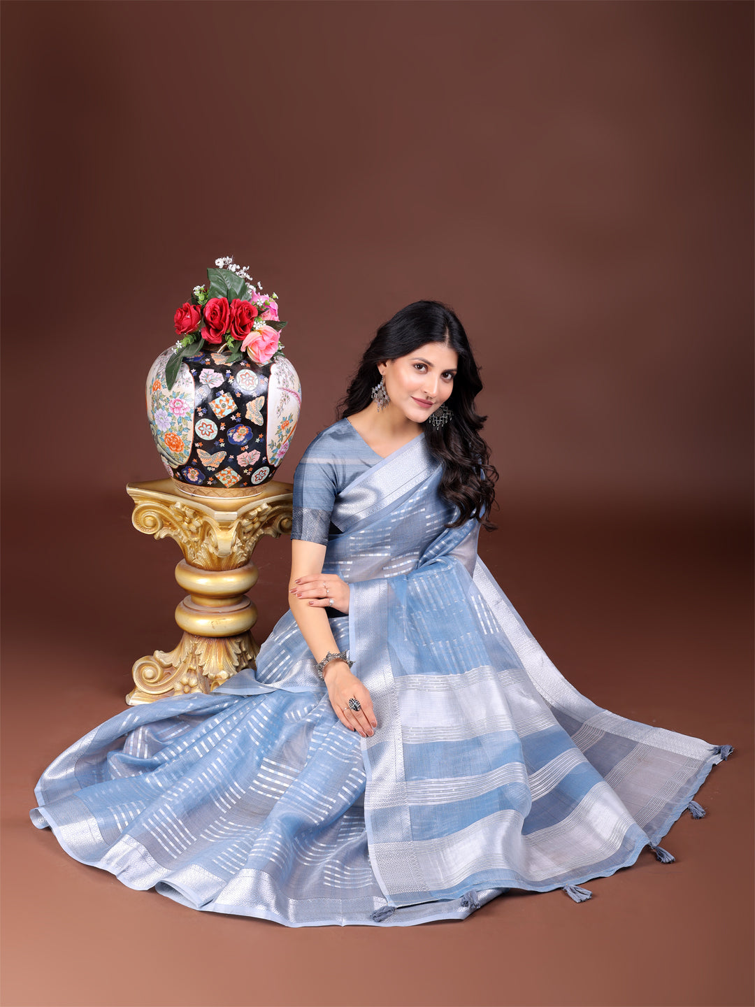 Sky Blue Organza Saree with Woven Zari Work and Tassels