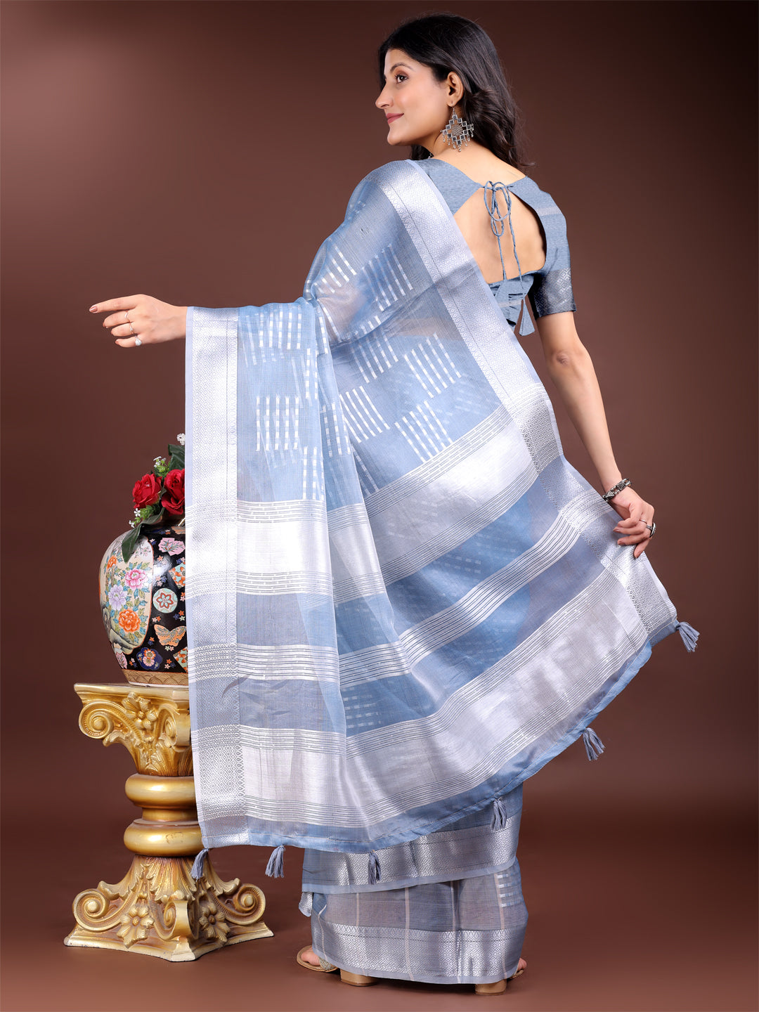 Sky Blue Organza Saree with Woven Zari Work and Tassels