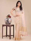 Peach colored organza saree with intricate woven zari work and traditional tassels.