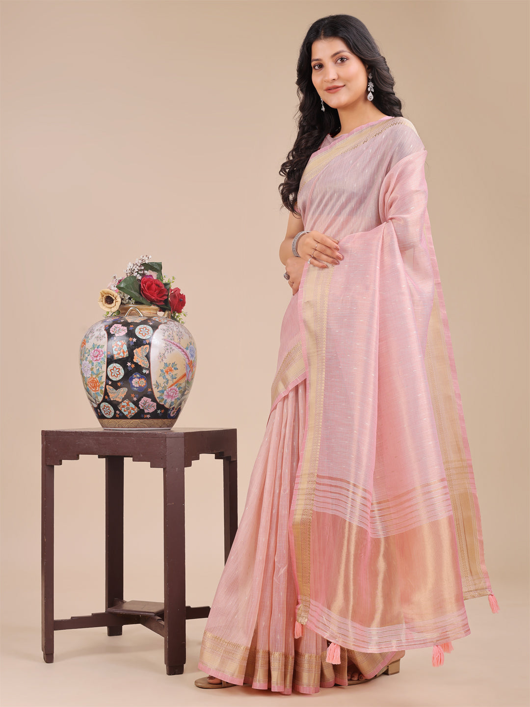 Light Pink Organza Saree with Traditional Woven Zari and Tassels