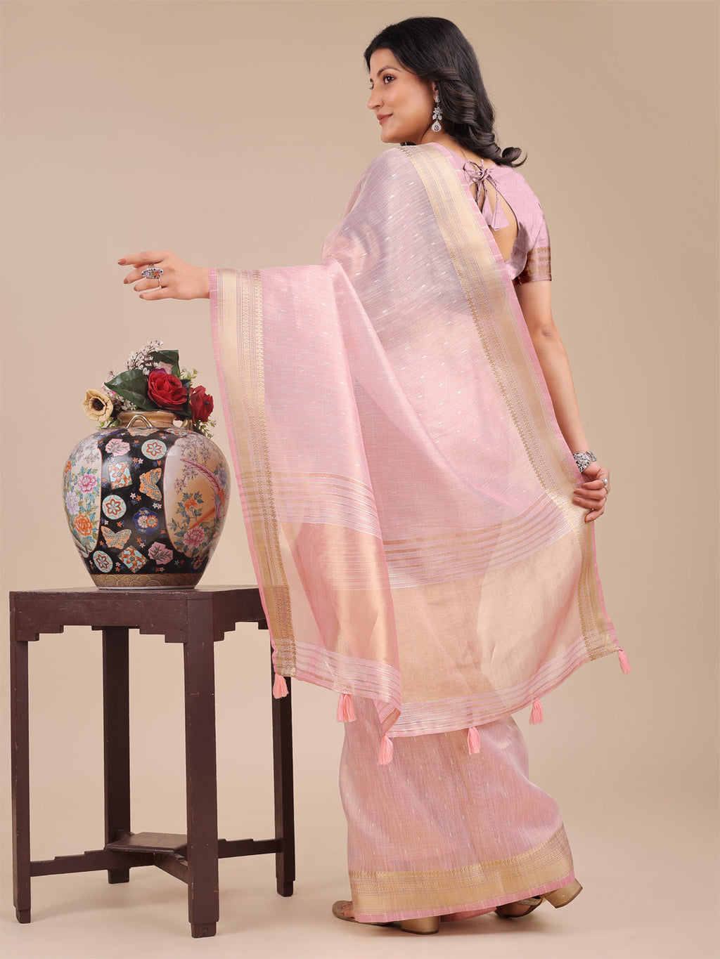 Light Pink Organza Saree with Traditional Woven Zari and Tassels