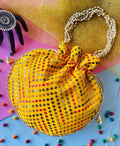Yellow bohemian style potli bag for women with geometric pattern