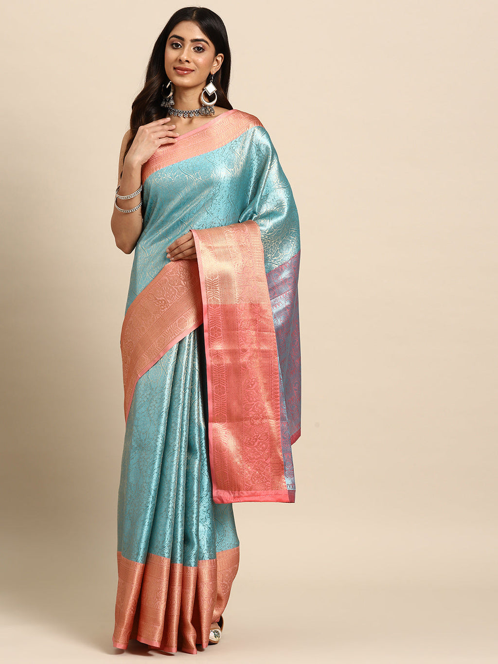Turquoise tissue silk saree with intricate floral zari weave