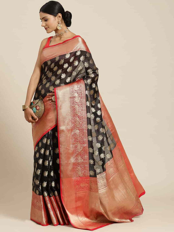Elegant black pure silk saree with detailed gold woven zari animal motifs.