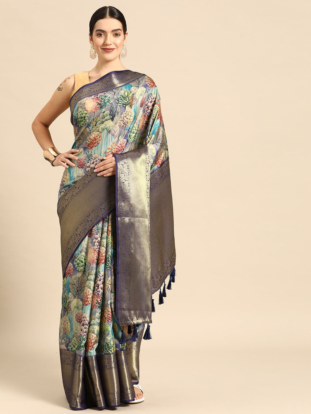 Elegant blue Kanchipuram silk saree featuring vibrant digital floral prints.