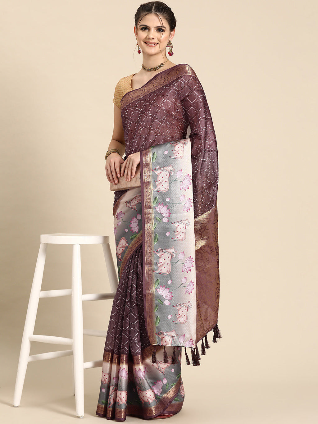 Purple Kanjeevaram silk saree with geometric digital prints and accompanying unstitched blouse fabric.