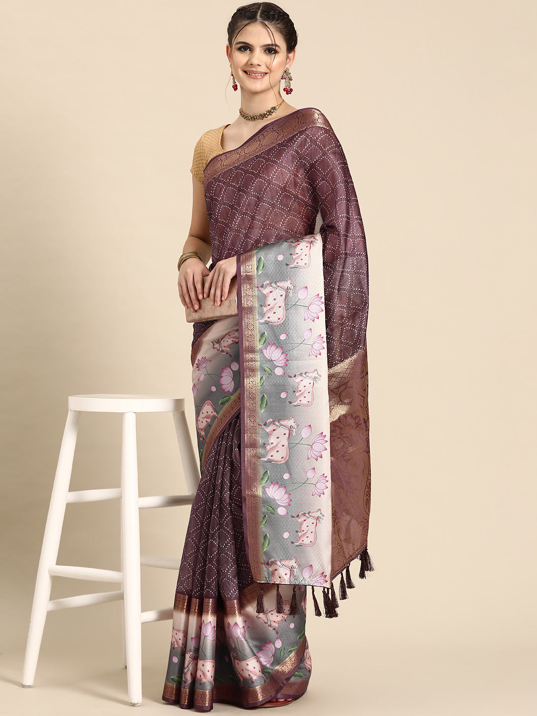 Purple Kanjeevaram silk saree with geometric digital prints and accompanying unstitched blouse fabric.