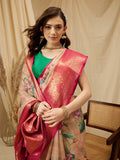 Peach colored Munga silk saree with floral digital prints and an unstitched blouse fabric.