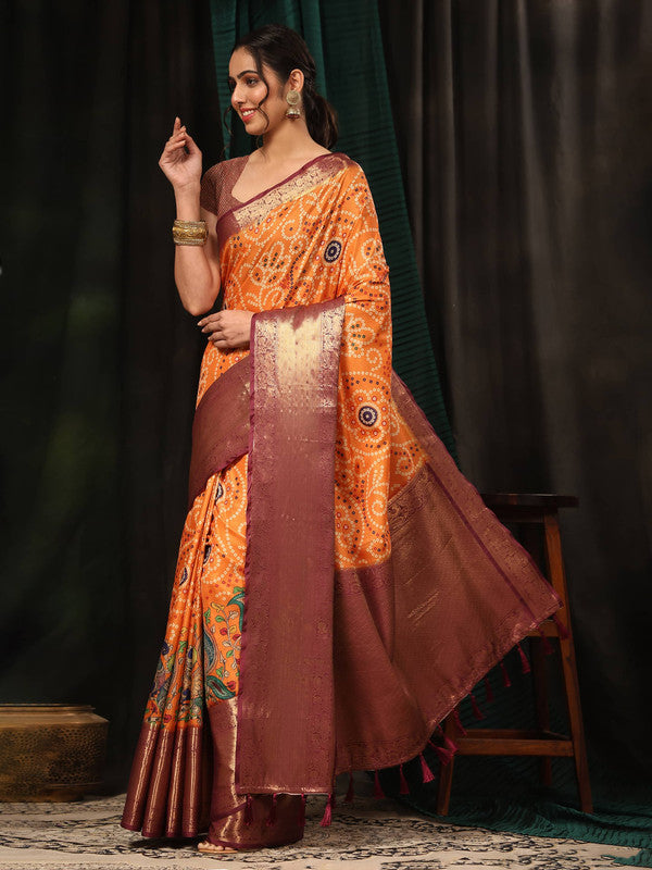 Vibrant orange silk blend saree with traditional Bandhani-style digital print