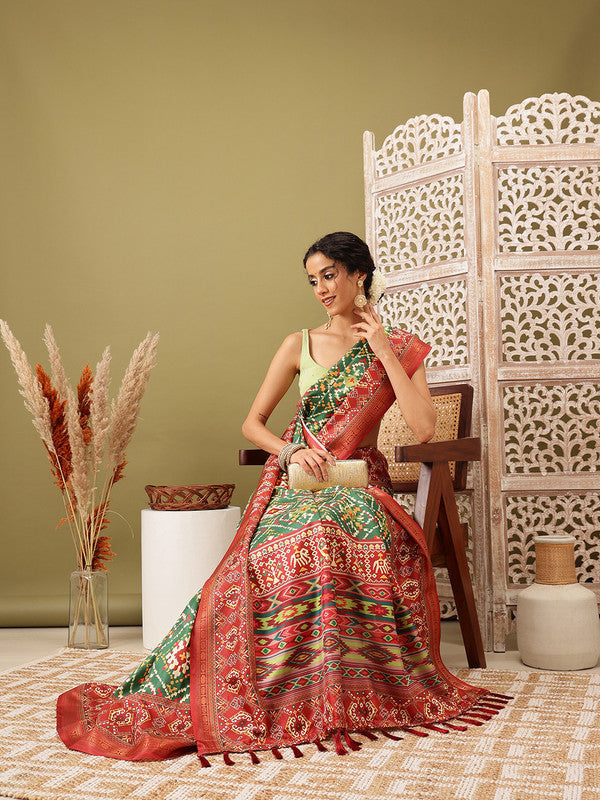 Green silk blend saree with bold digital Ikkat print and unstitched blouse