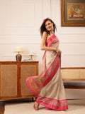 Beautifully draped beige Kotha silk saree with floral digital prints.