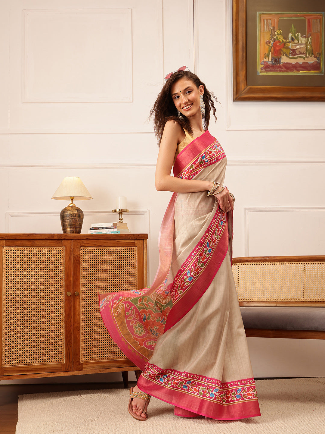 Beautifully draped beige Kotha silk saree with floral digital prints.
