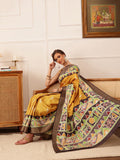 Elegant yellow Kotha silk saree with vibrant floral digital prints.