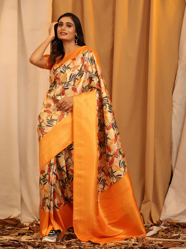 Vibrant orange silk blend saree featuring woven zari floral patterns and matching blouse fabric.