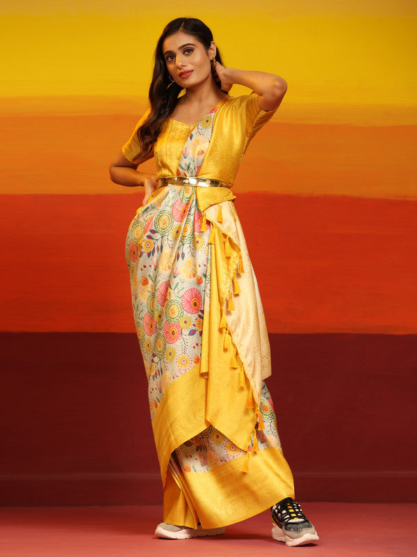 Elegant yellow silk blend saree with intricate floral zari weaving and matching unstitched blouse piece.