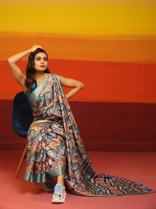 Turquoise silk blend saree with woven Zari floral patterns and unstitched blouse