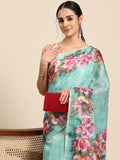 Turquoise cotton blend saree with vibrant digital floral print and matching unstitched blouse piece.