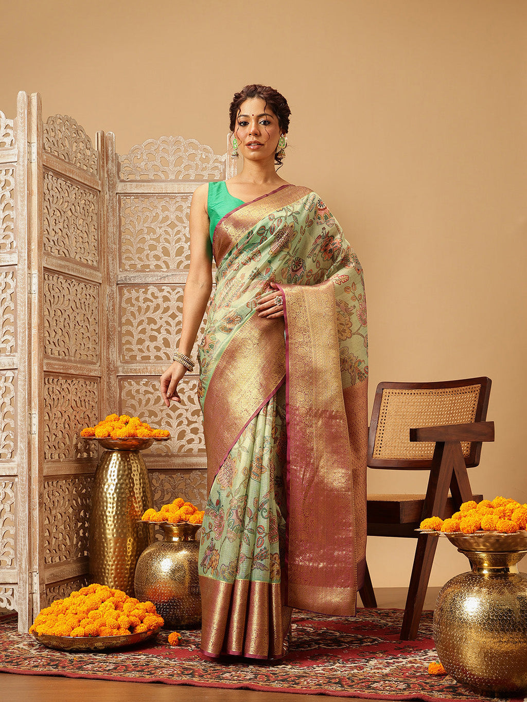 Green Banarasi Muga silk saree adorned with detailed Pichwai digital prints, featuring a elegant drape.