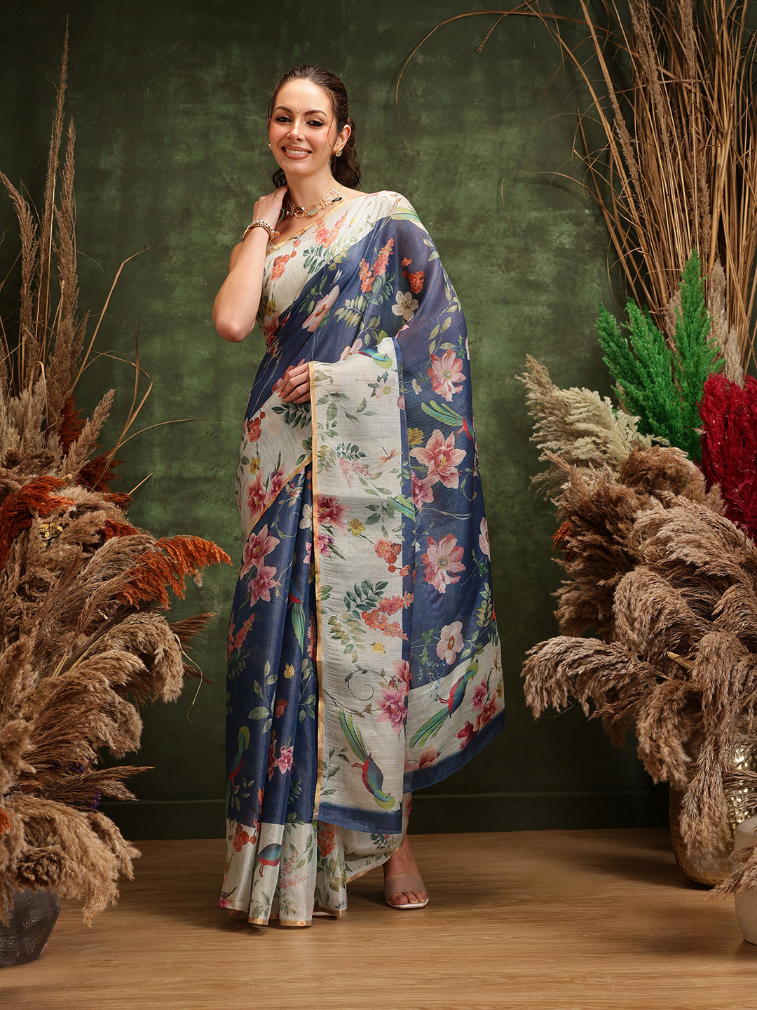 Beautiful blue Chanderi cotton blend saree with elegant floral prints.