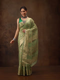 Green floral cotton saree with woven zari design and unstitched blouse