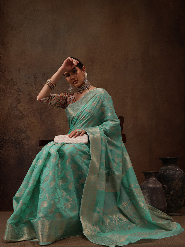 Turquoise cotton saree with woven zari floral patterns and unstitched blouse