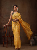 Yellow cotton saree with woven zari floral motifs and unstitched blouse piece