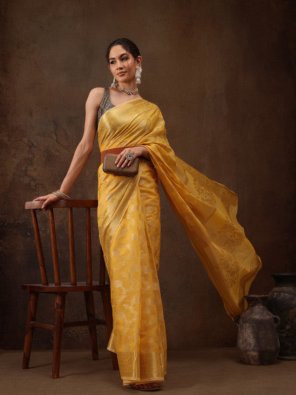 Yellow cotton saree with woven zari floral motifs and unstitched blouse piece