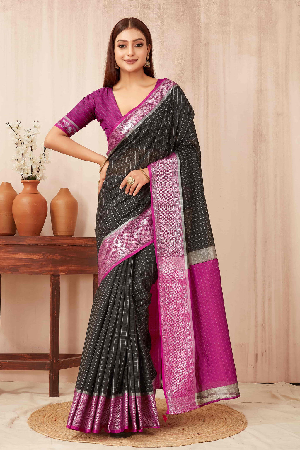 Black Banarasi soft silk saree with traditional zari woven checks and elegant drape