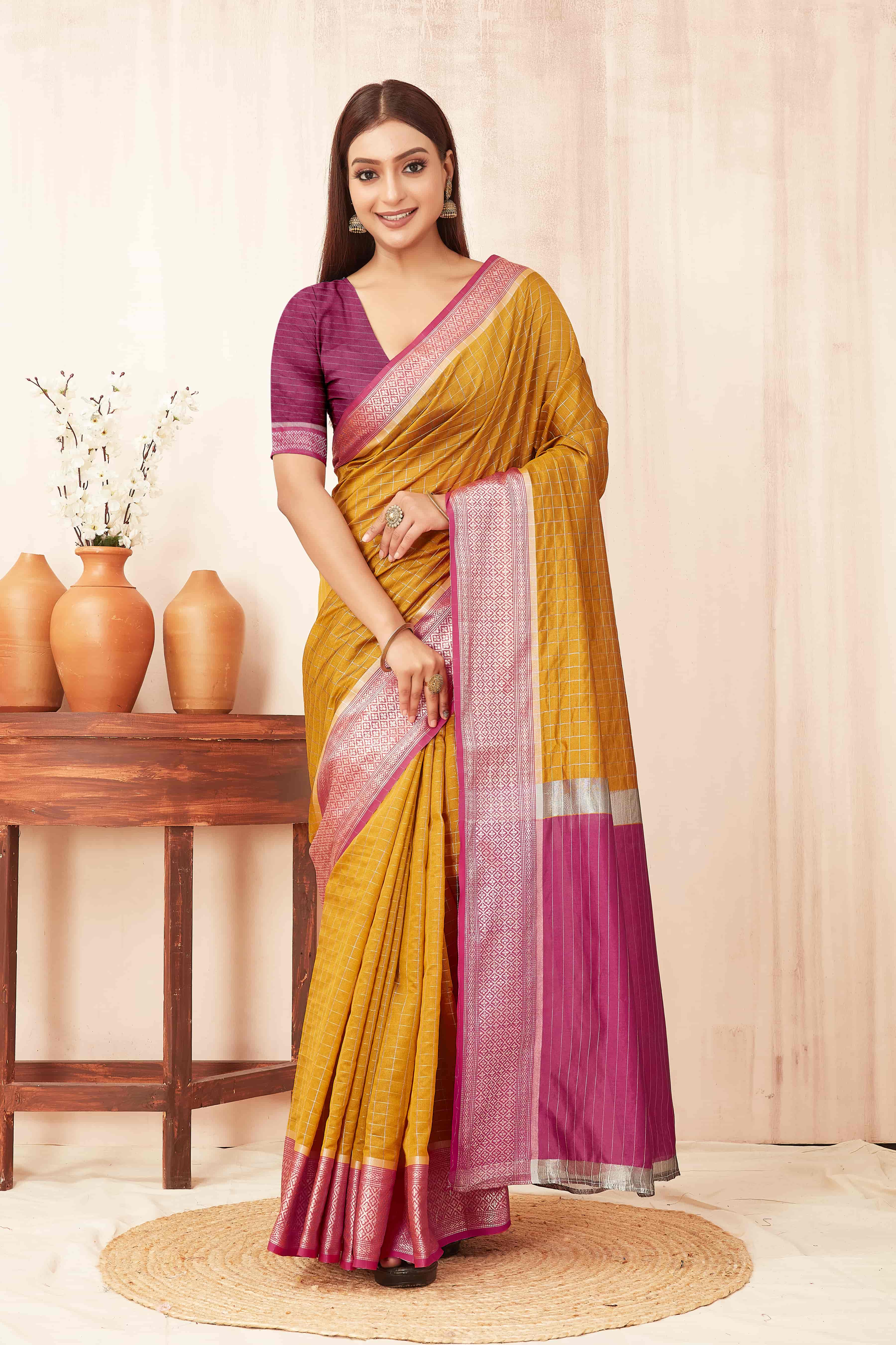 Mustard Banarasi soft silk saree with traditional checks pattern and zari woven border