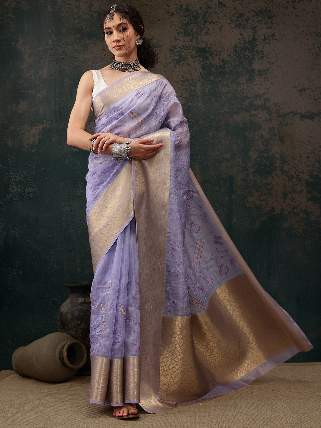 Lavender Kota Doria saree featuring delicate floral embroidery
