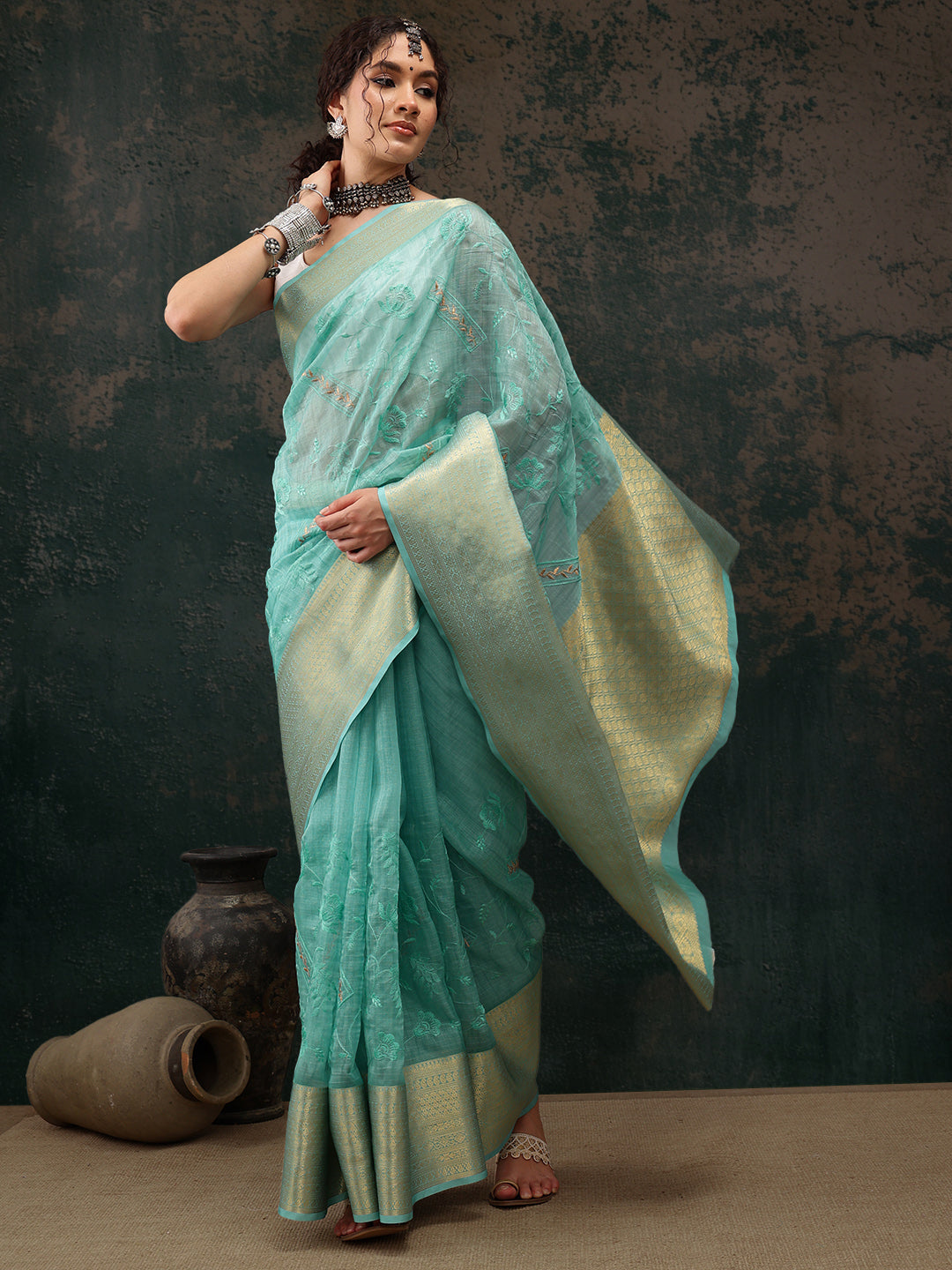 Turquoise Kota Doria saree with floral embroidery and unstitched blouse