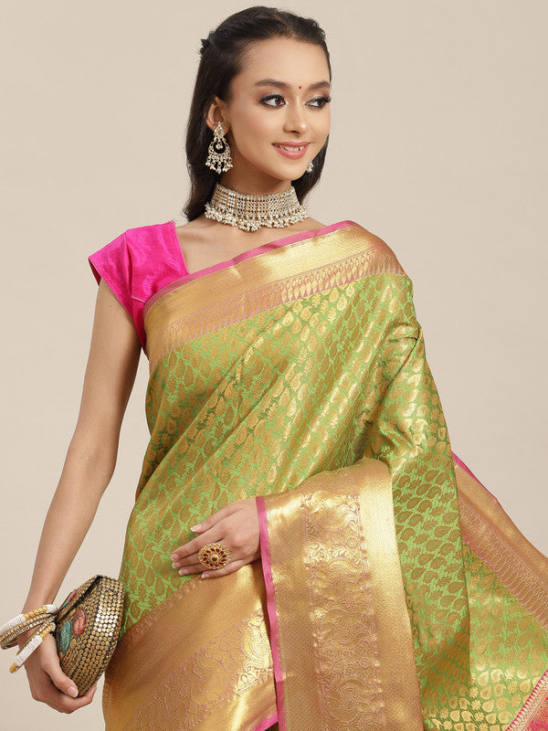 Green brocade saree with traditional zari paisley weaving and unstitched blouse